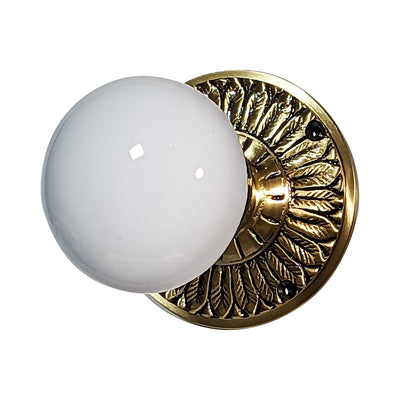 White Porcelain Door Knob with Brass Feathers Rosette
